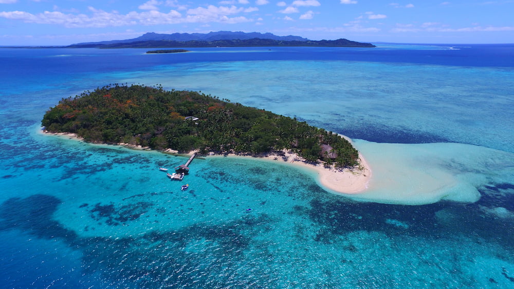 Aerial photo of Leleuvia Island Resort and their protected reefs