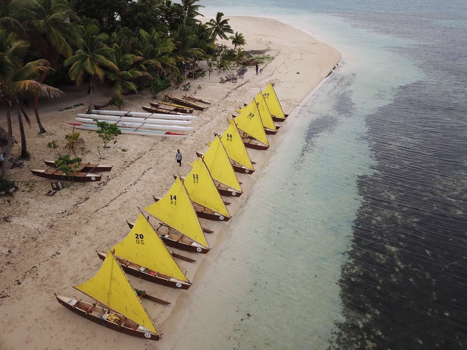 Drua canoes lined up on beach