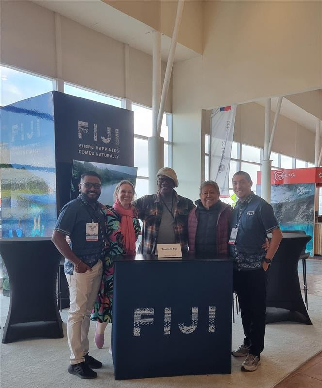 Duavata and Tourism Fiji team members pose for a photo at ATWS
